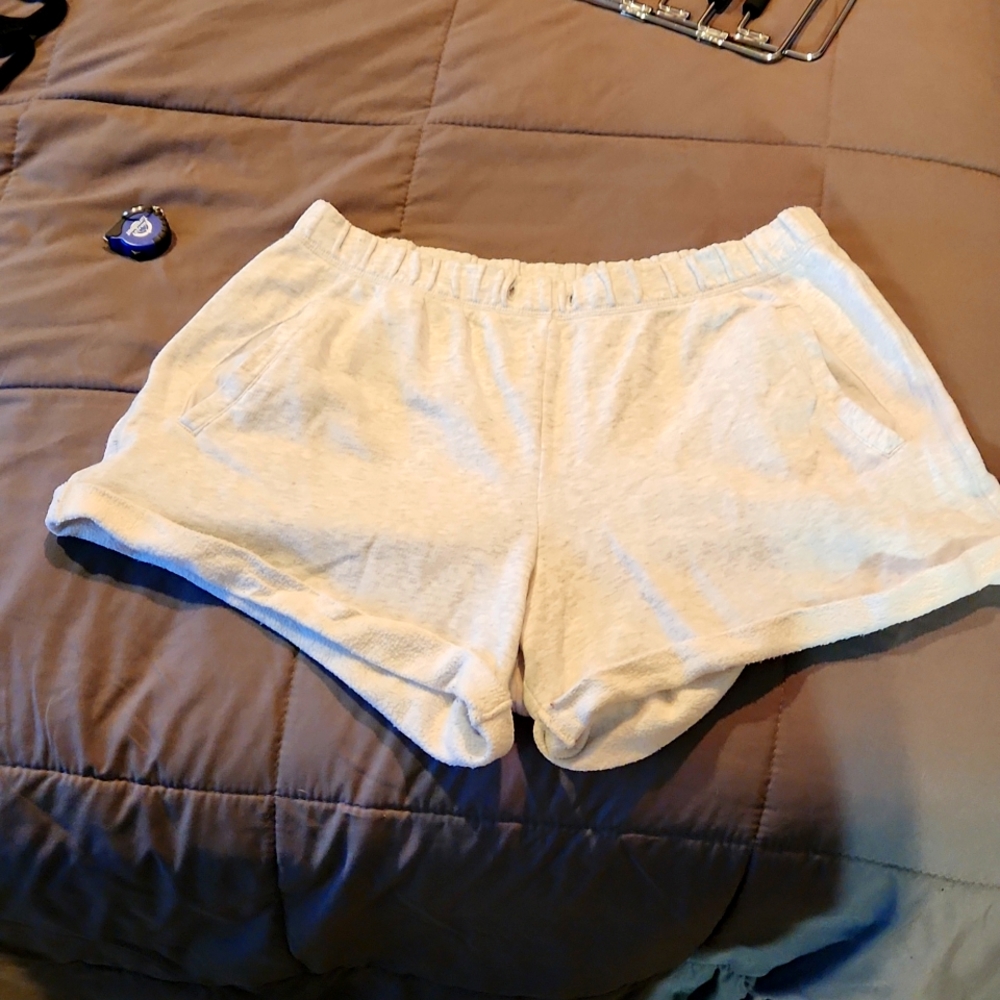 Pink shorts, medium size,  gray with black print.